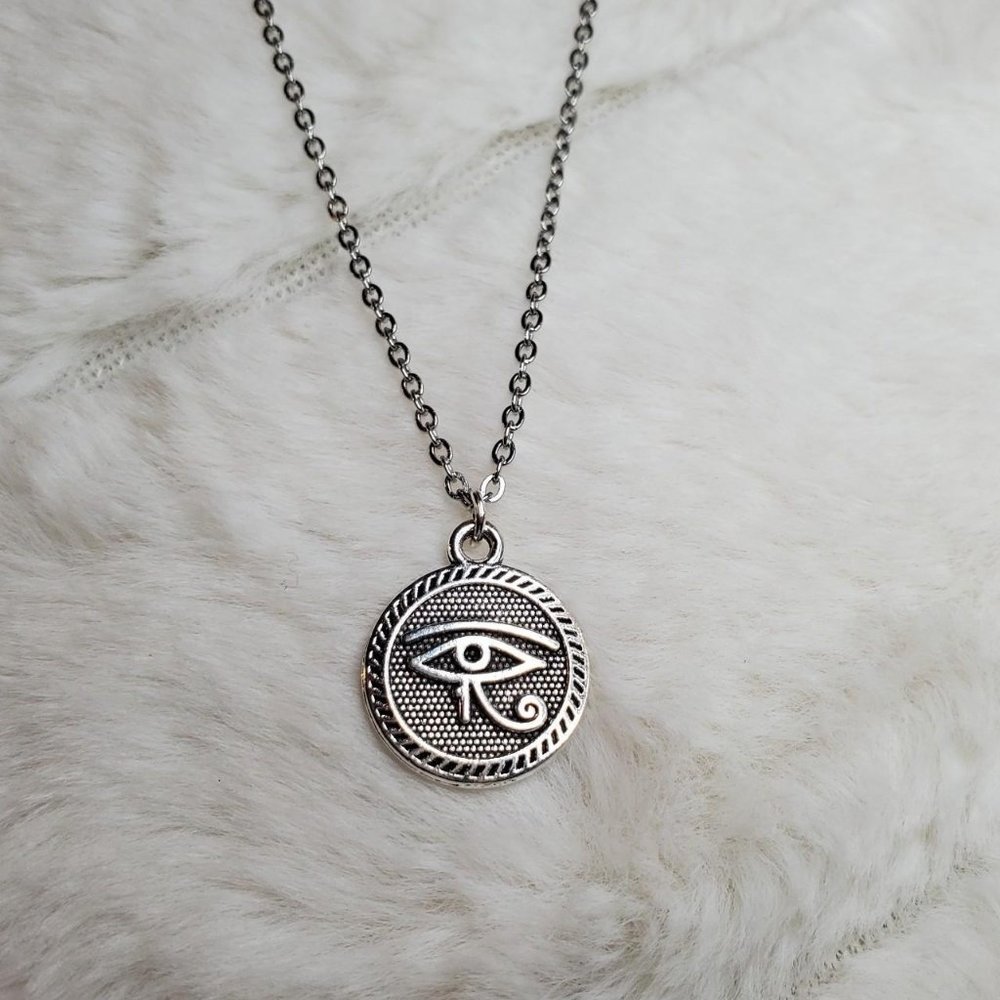 Circle eye of horus charm necklace.